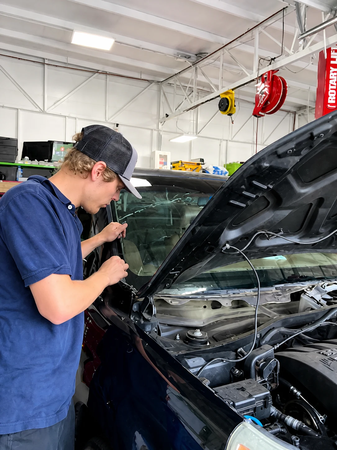 VanGo technician completing an auto glass installation